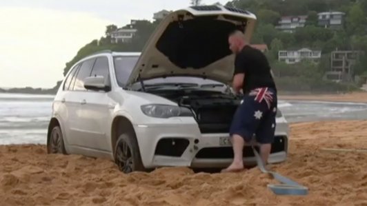 Đưa BMW X5 đi tắm biển và nhận được cái kết đắng