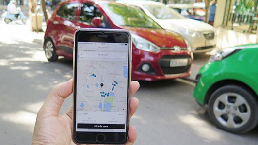 Hà Nội chính thức cấm dịch vụ đi chung xe của Grab và Uber